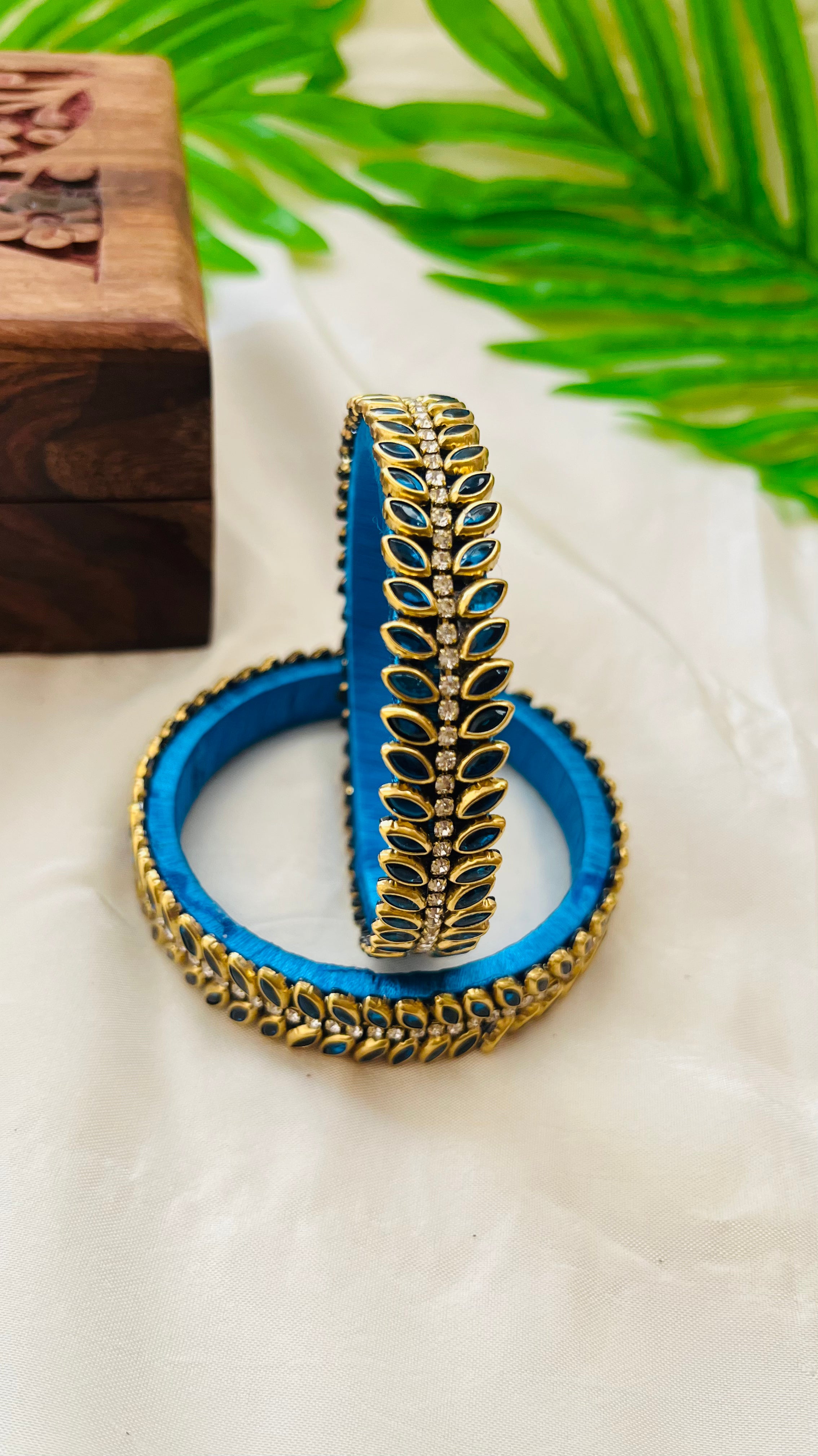 ANIKSHYA HANDMADE TEAL BLUE AND WHITE KUNDAN BANGLE VH011