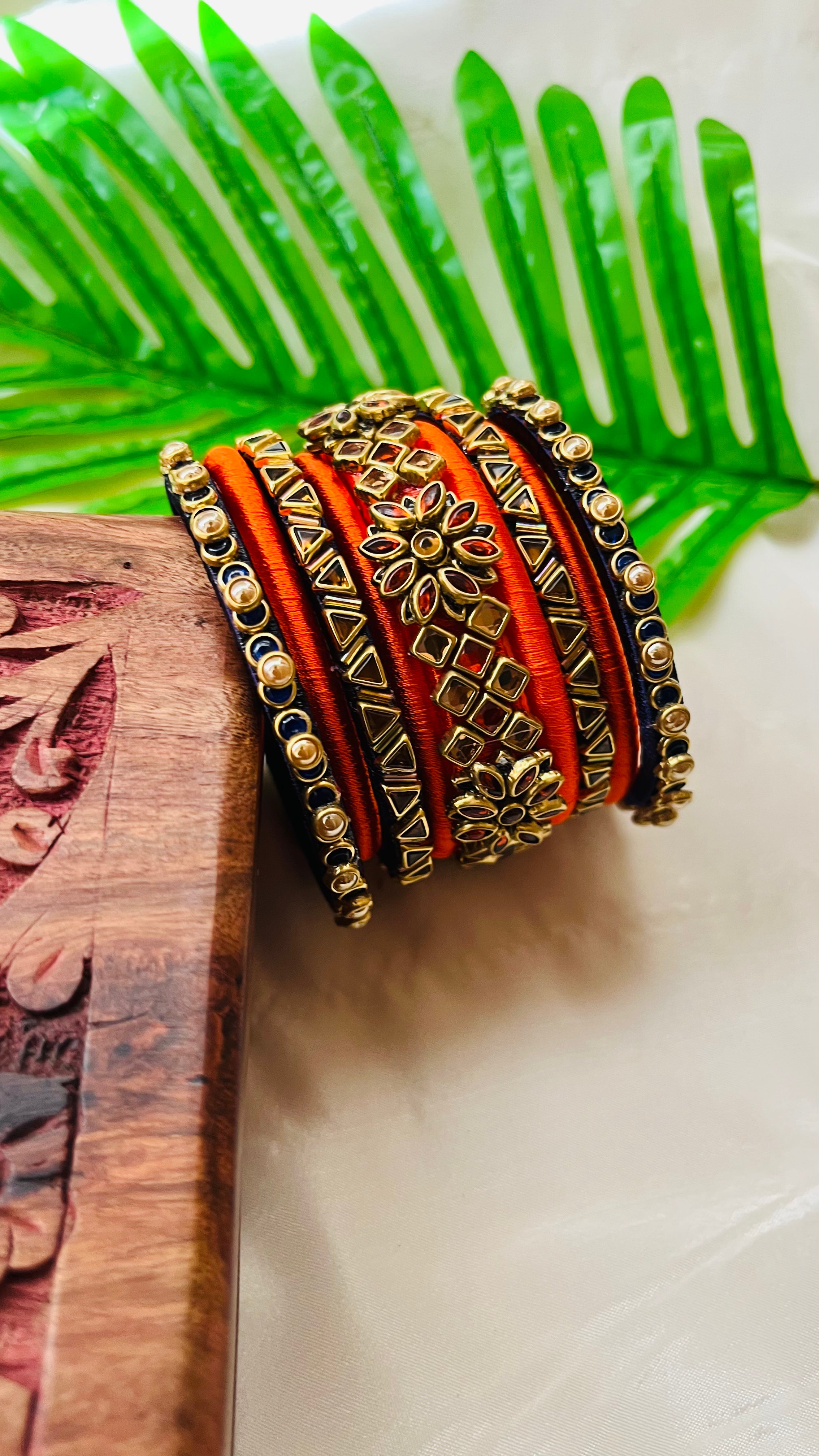 ANIKSHYA HANDMADE ORANGE AND GOLD KUNDAN BANGLE VH021