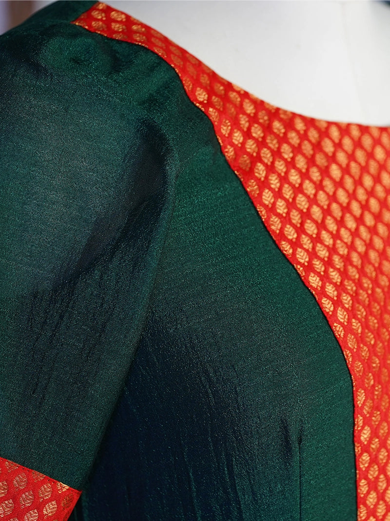 Anikshya Bottle green with Banarasi party wear Dress