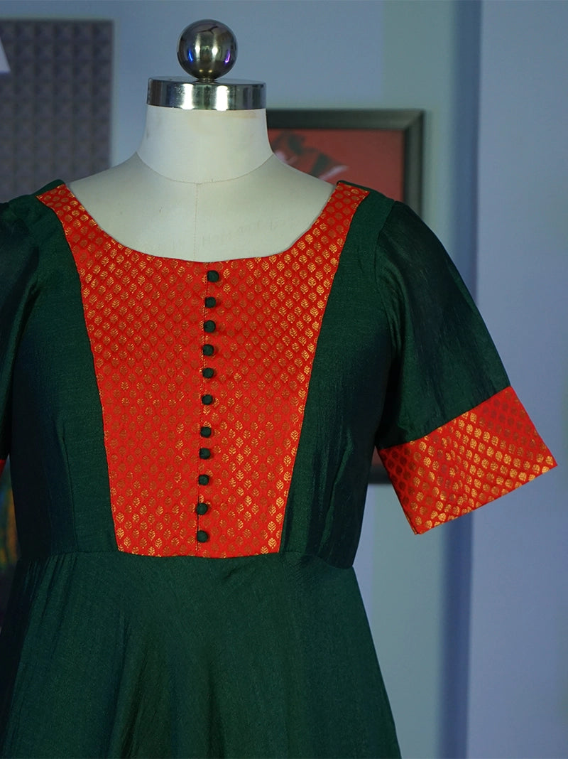 Anikshya Bottle green with Banarasi party wear Dress