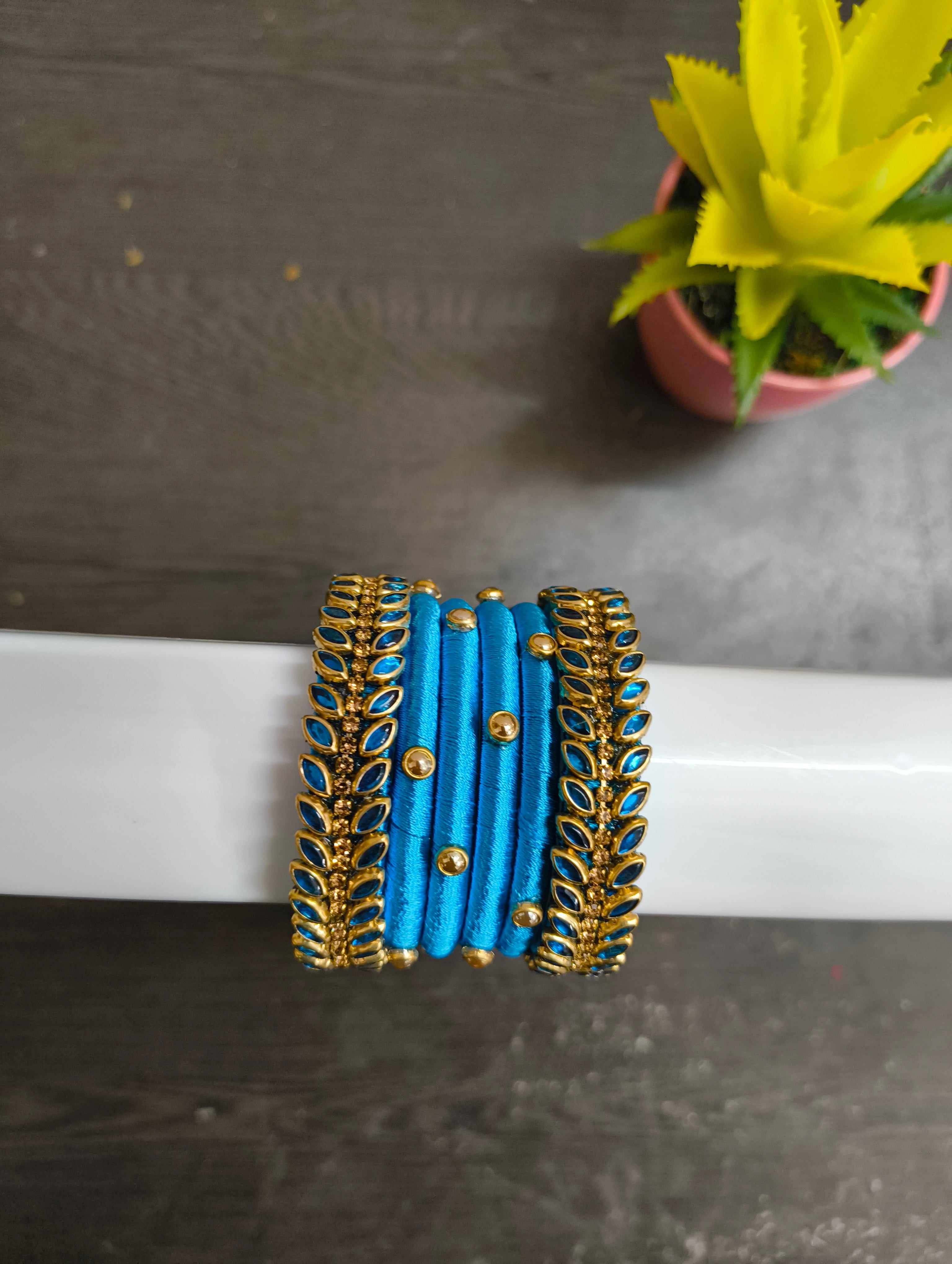 ANIKSHYA KIDS HANDMADE COPPER SULPHATE BLUE KUNDAN BANGLE VH074