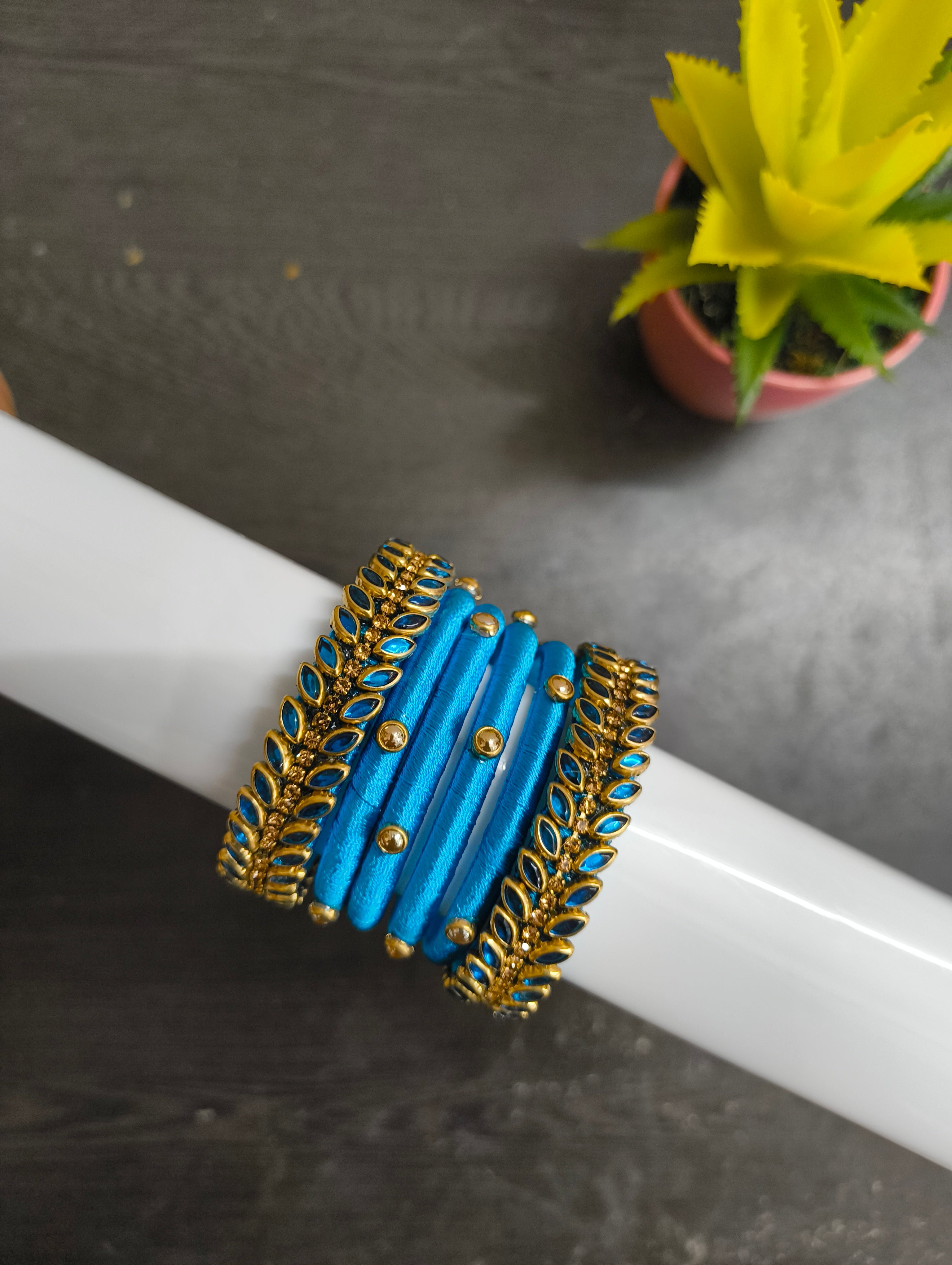 ANIKSHYA KIDS HANDMADE COPPER SULPHATE BLUE KUNDAN BANGLE VH074
