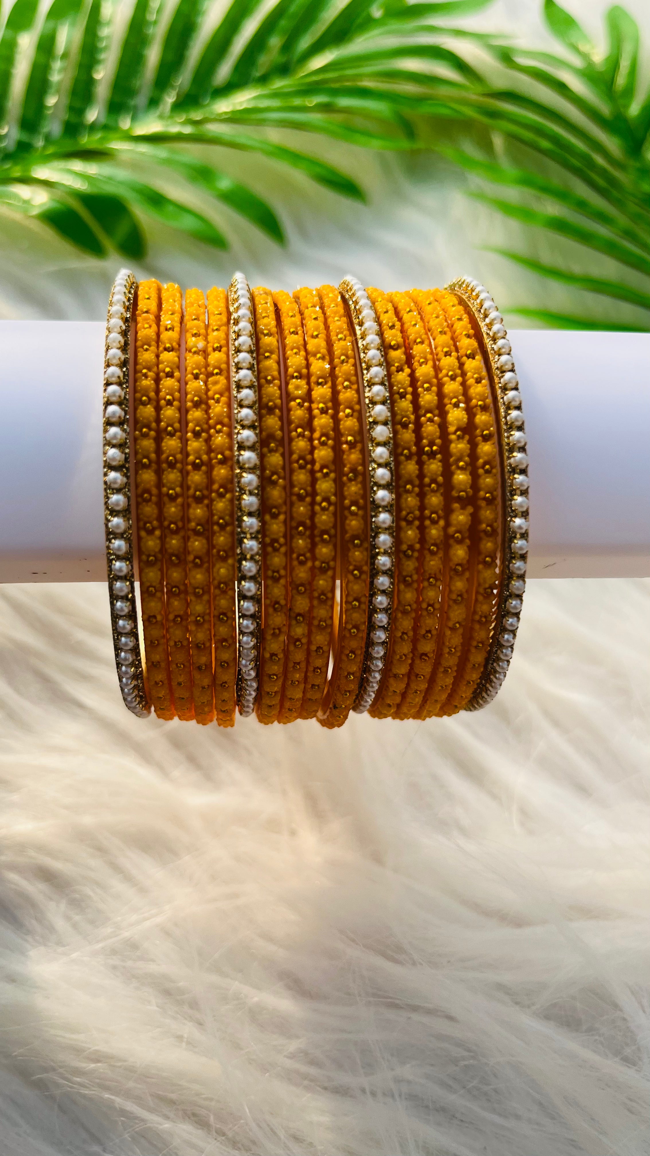 ANIKSHYA YELLOW GLASS BANGLE AND WHITE PEARL BORDER BANGLE VH034