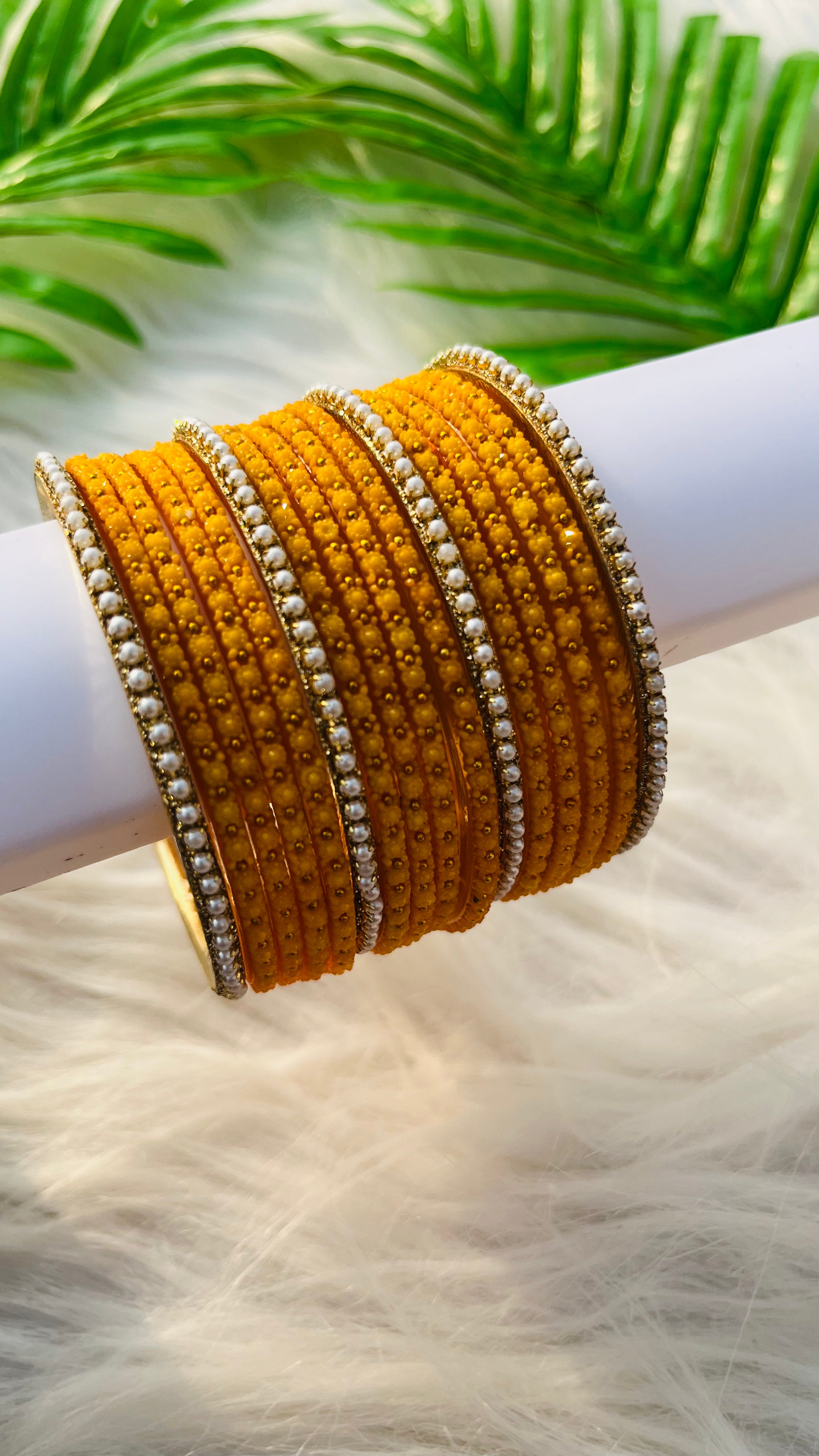 ANIKSHYA YELLOW GLASS BANGLE AND WHITE PEARL BORDER BANGLE VH034