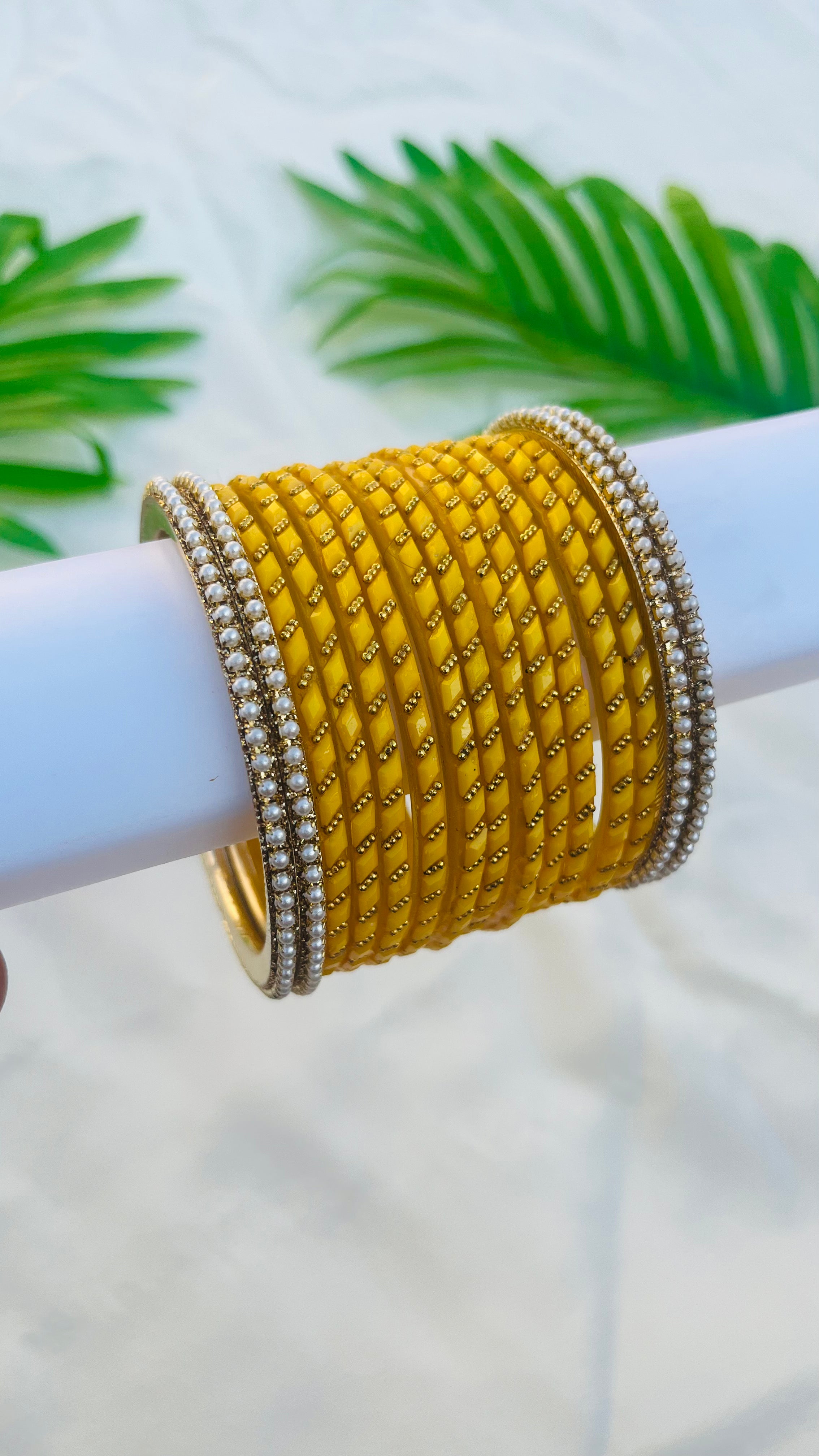 ANIKSHYA YELLOW GLASS BANGLE AND WHITE PEARL METAL BANGLE VH051