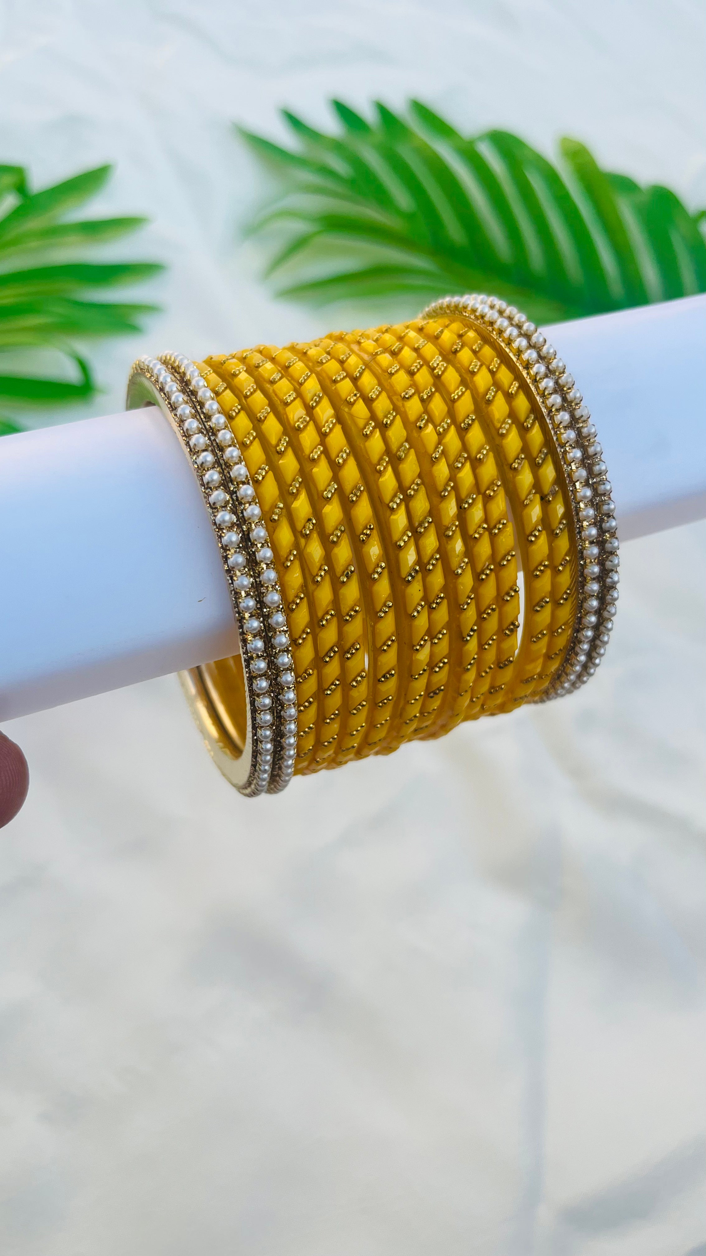 ANIKSHYA YELLOW GLASS BANGLE AND WHITE PEARL METAL BANGLE VH051