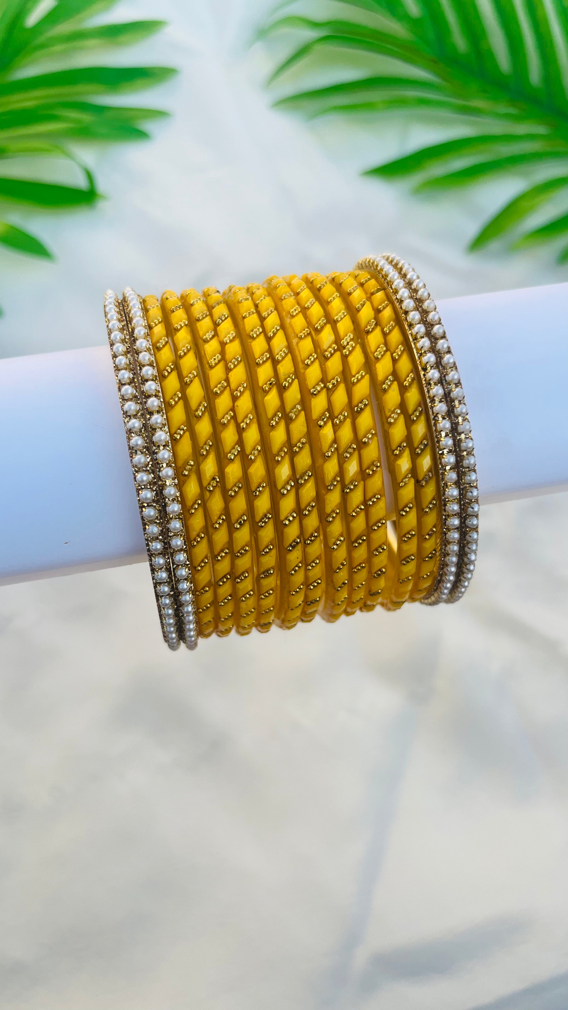 ANIKSHYA YELLOW GLASS BANGLE AND WHITE PEARL METAL BANGLE VH051