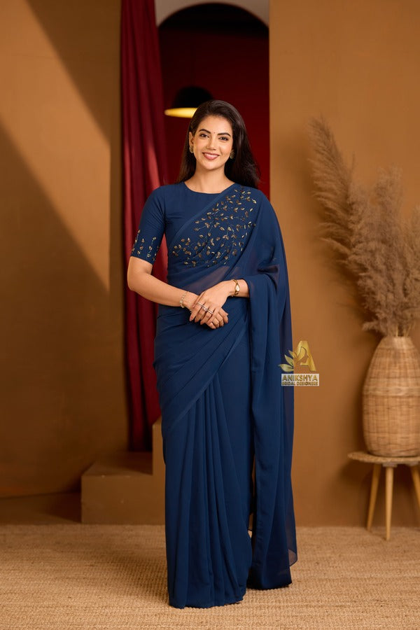 Mayuri Teal Blue Handwork Georgette saree