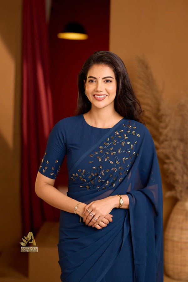 Mayuri Teal Blue Handwork Georgette saree