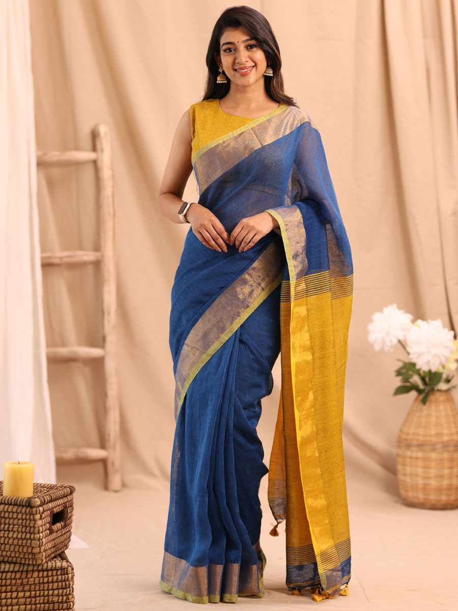 Anikshya Blue Linen saree with Antique gold Border