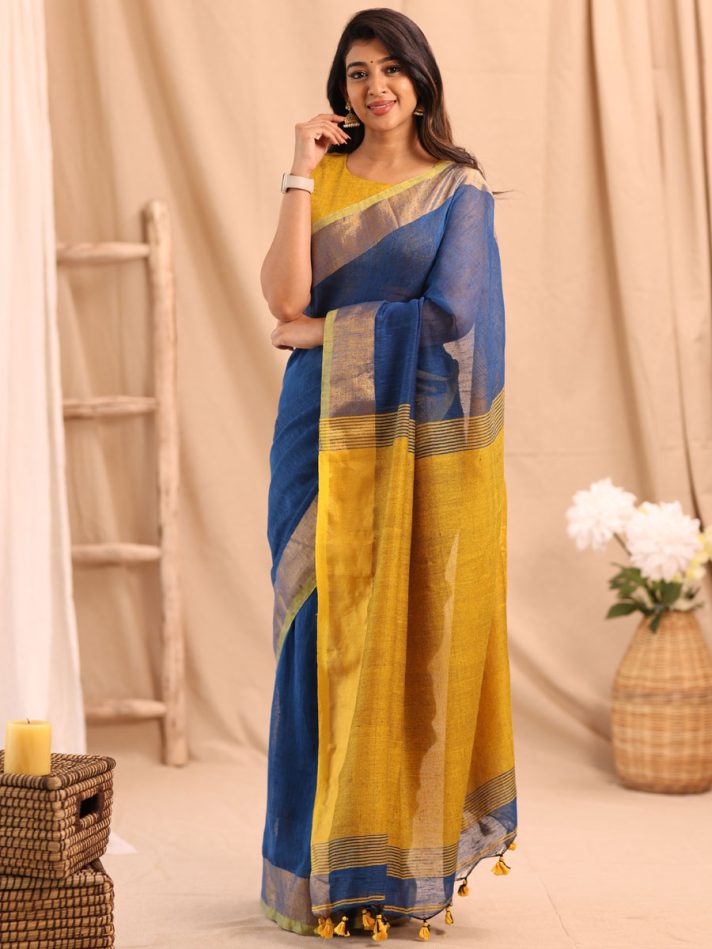 Anikshya Blue Linen saree with Antique gold Border