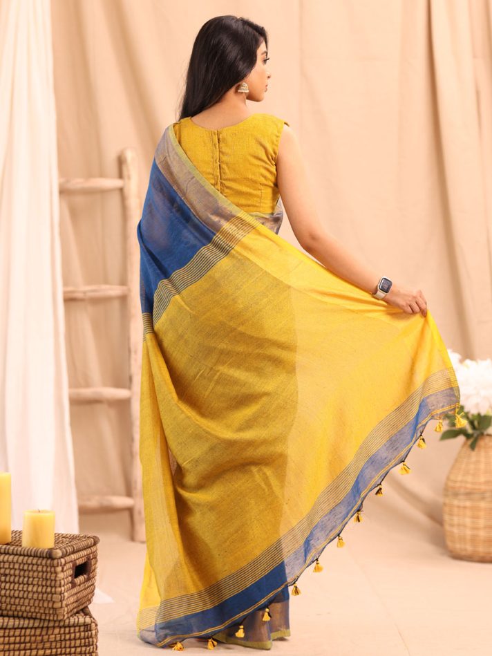 Anikshya Blue Linen saree with Antique gold Border