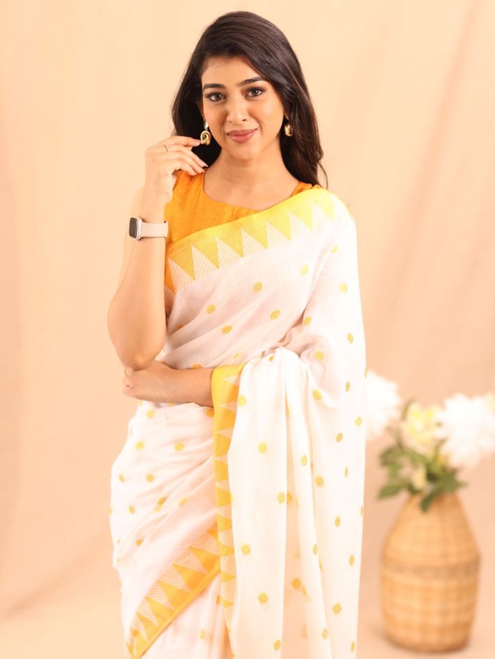 Anikshya Mul Khadi white saree with Temple border