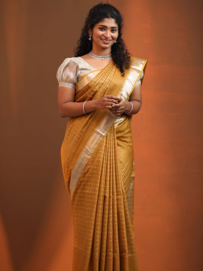 Anikshya Mustard Yellow Kota Viscose Silk checks saree with silver Border