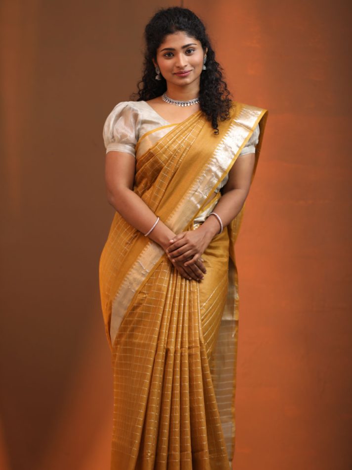 Anikshya Mustard Yellow Kota Viscose Silk checks saree with silver Border