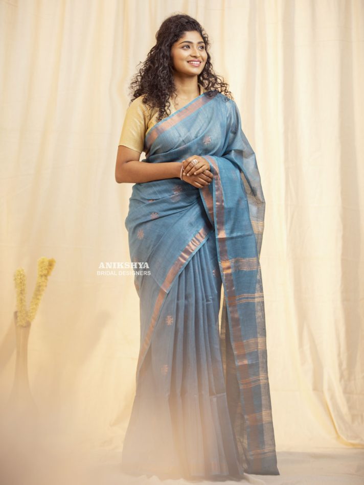 Anikshya Blue Kota Viscose Silk saree with copper Border