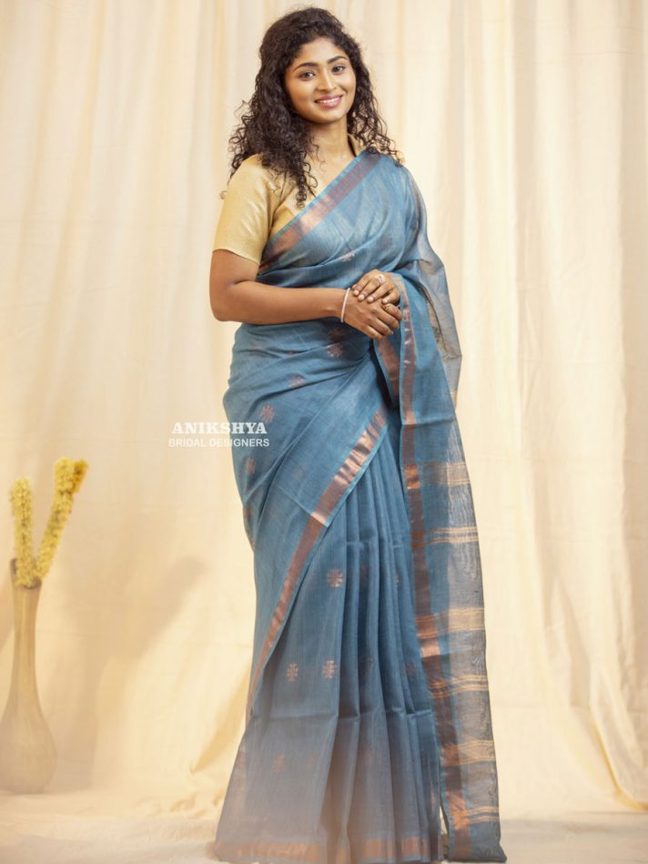 Anikshya Blue Kota Viscose Silk saree with copper Border