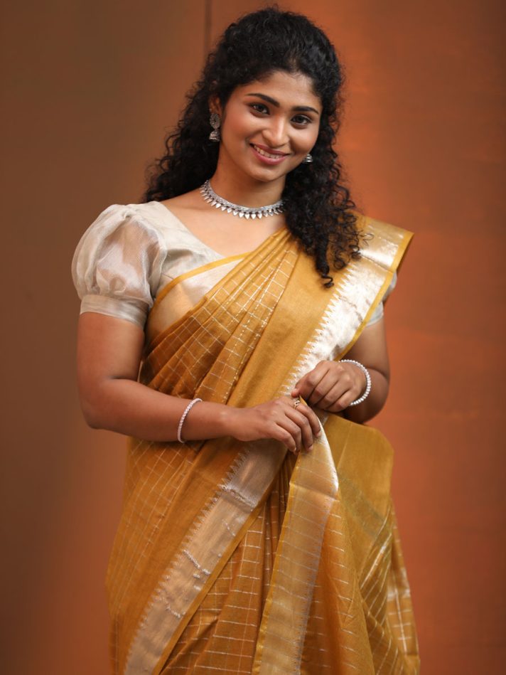 Anikshya Mustard Yellow Kota Viscose Silk checks saree with silver Border