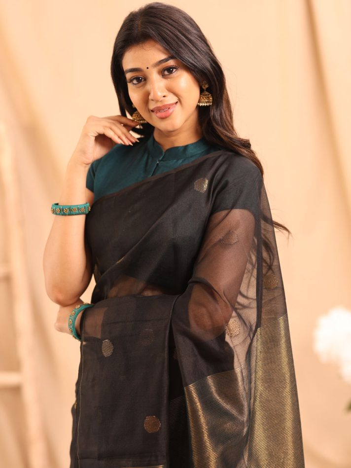 Anikshya Teal and Black Half Muslin saree