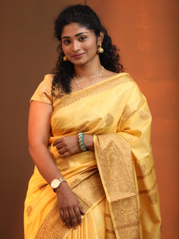 Anikshya Yellow Kota Viscose Silk saree with Copper Border